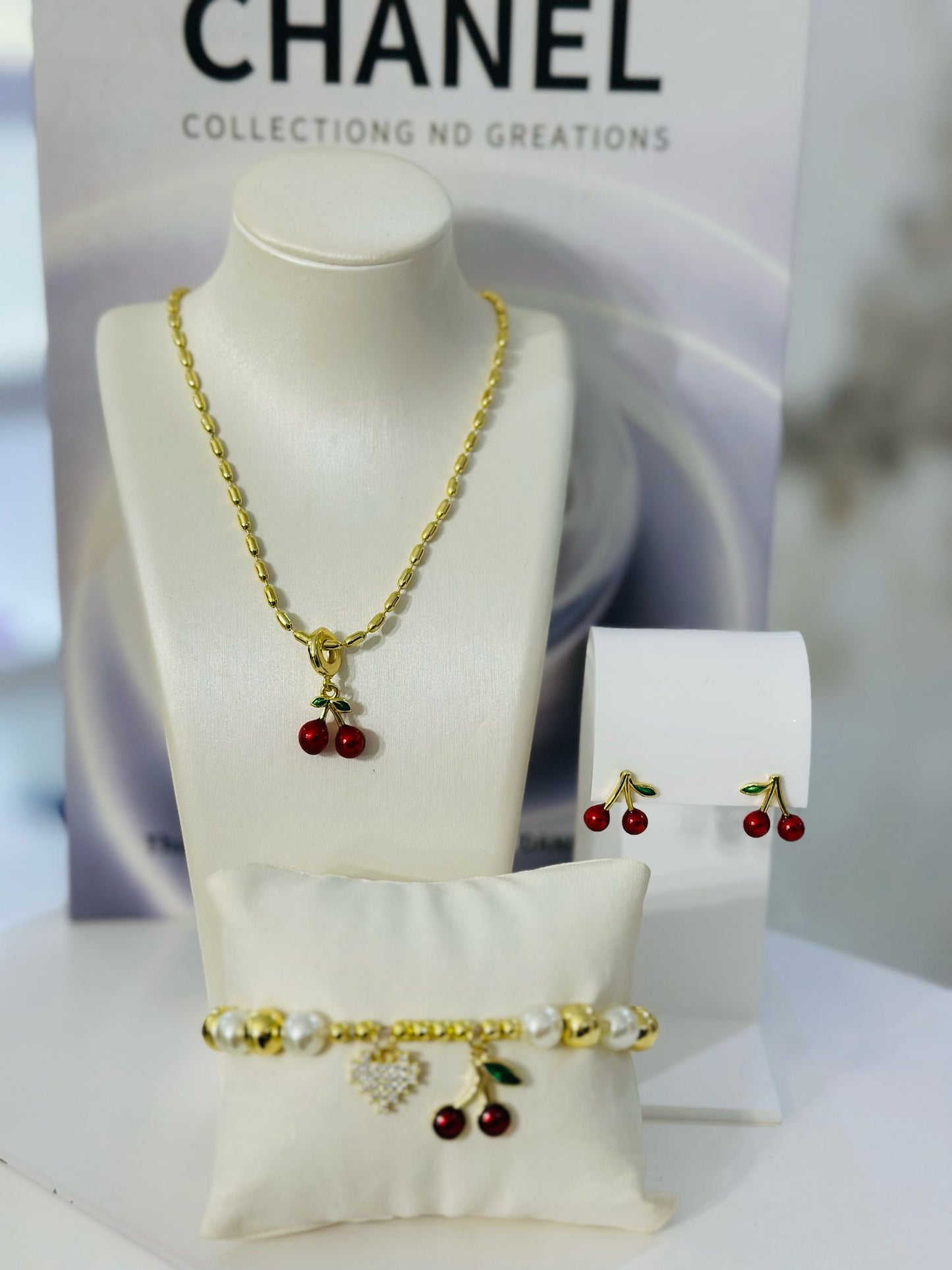 Cherry Gold Set (incluye aretes , pulsera y collar)