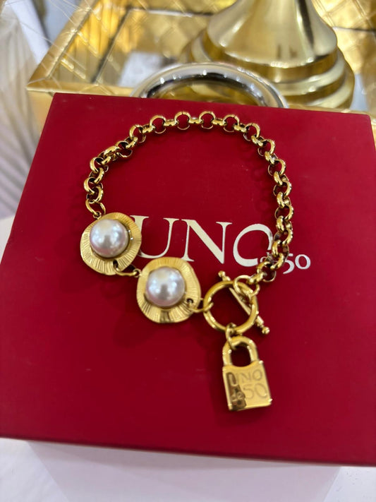 Uno Gold Pearl (material oro inoxidable)