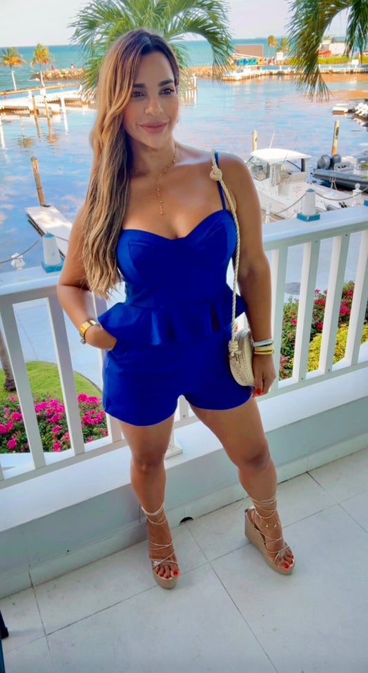 Costa Blue Romper (super spandex) puesto en Small